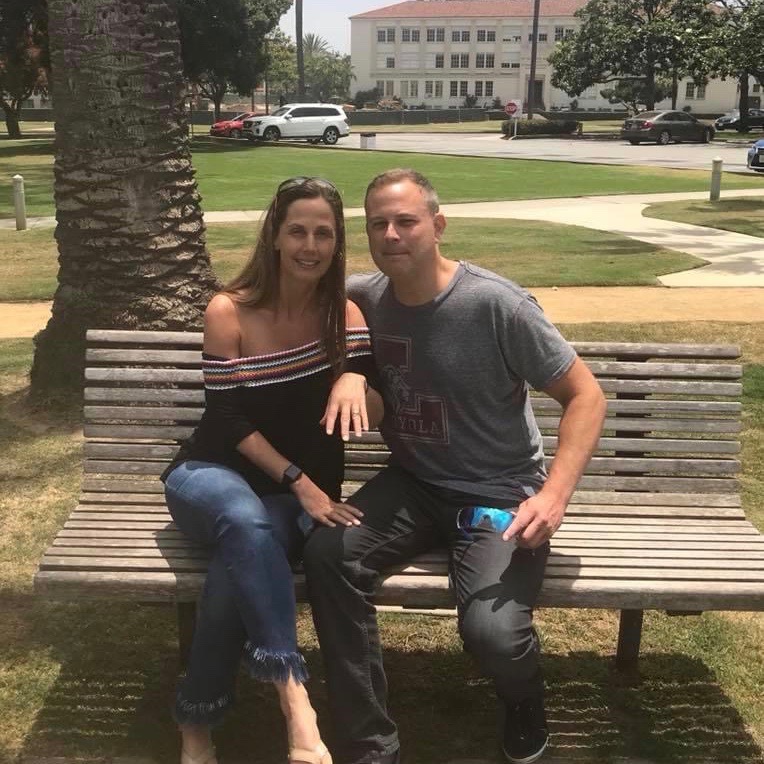 Couple sitting together on a bench